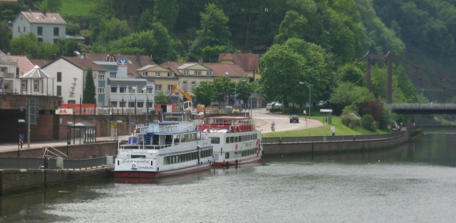 2 pleasure cruise boats on a big river at mettlach germany